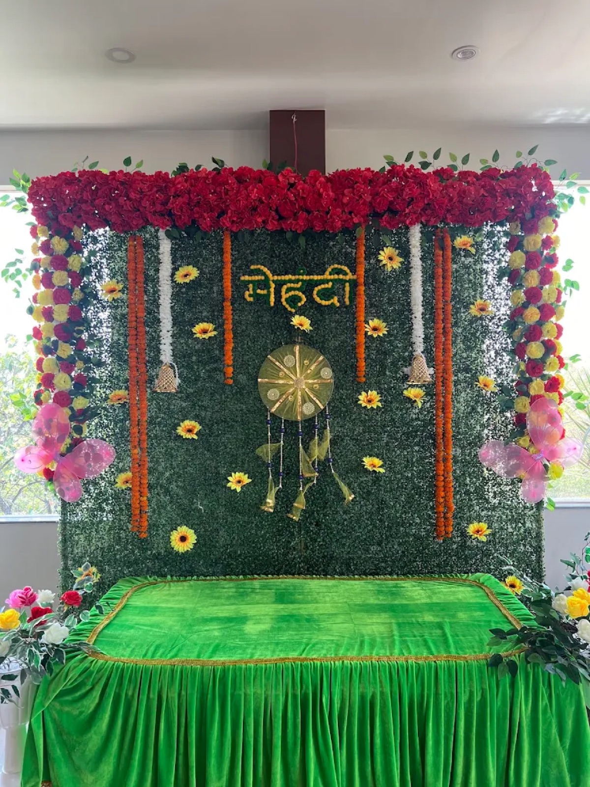 Floral mehndi backdrop setup at Shri Nath Palace banquet hall, Deoghar