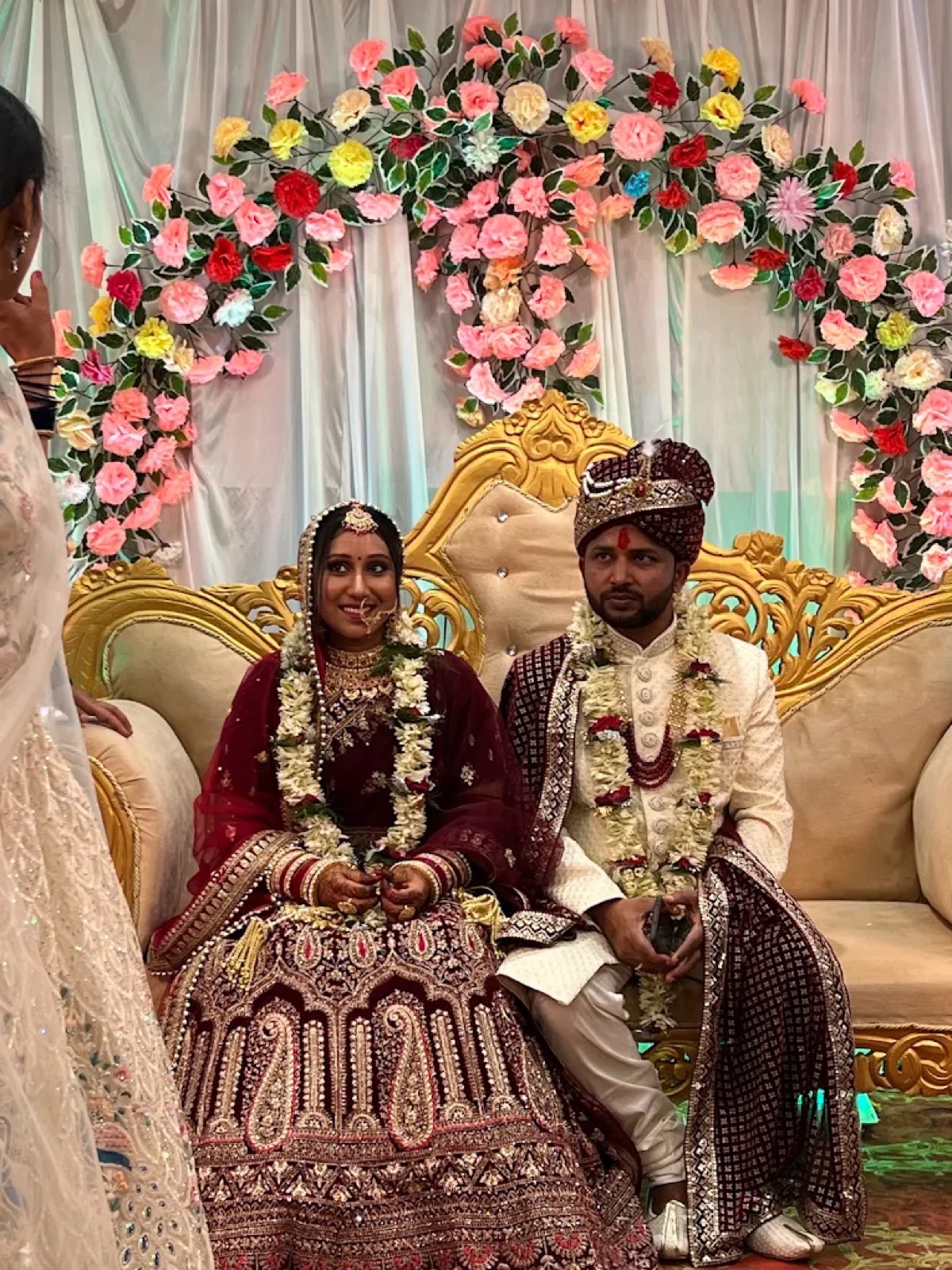 Bride and groom on a decorated stage at a wedding in Shri Nath Palace, Deoghar