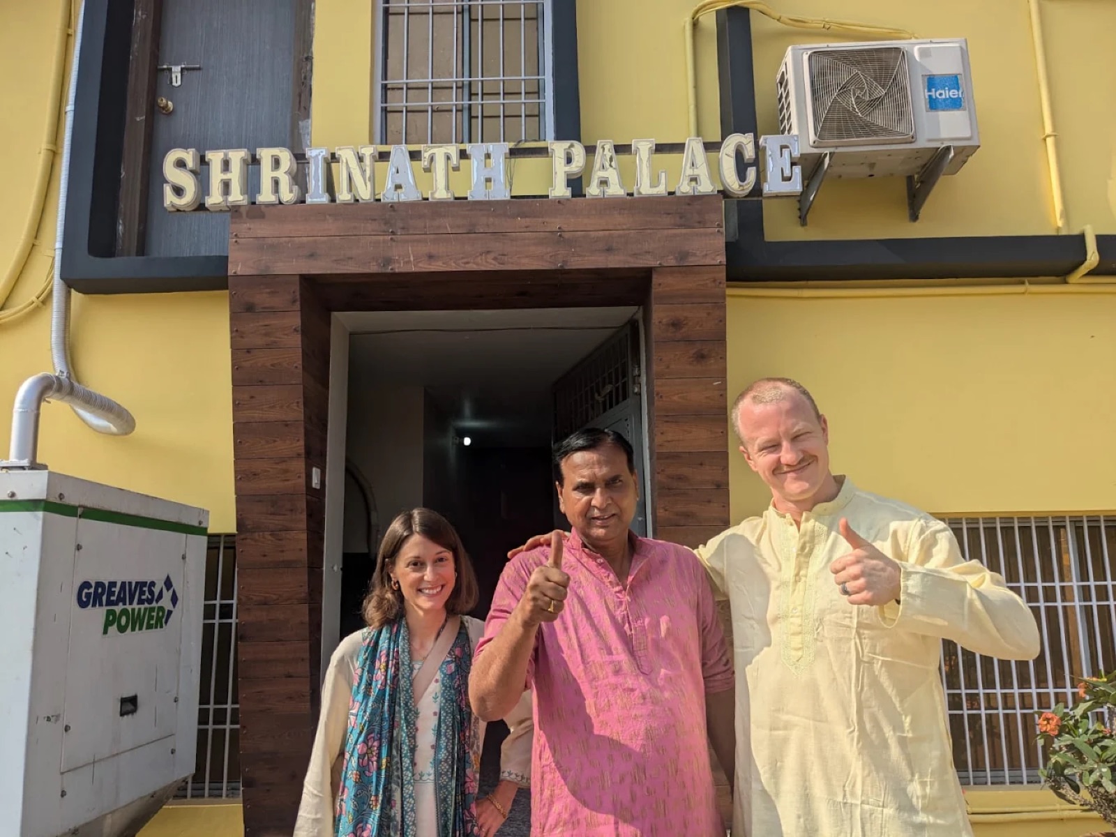 International guests with the owner at the entrance of Shri Nath Palace, Deoghar