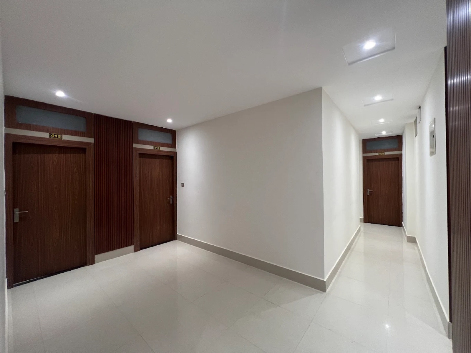 Clean, well-lit guest room corridor at Shri Nath Palace, Deoghar